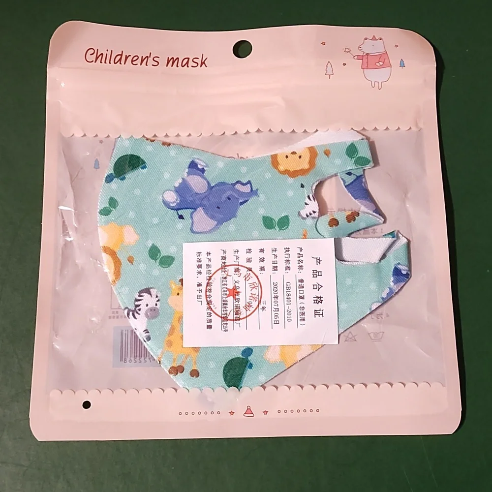 Children's re Usable face mask new in package never opened